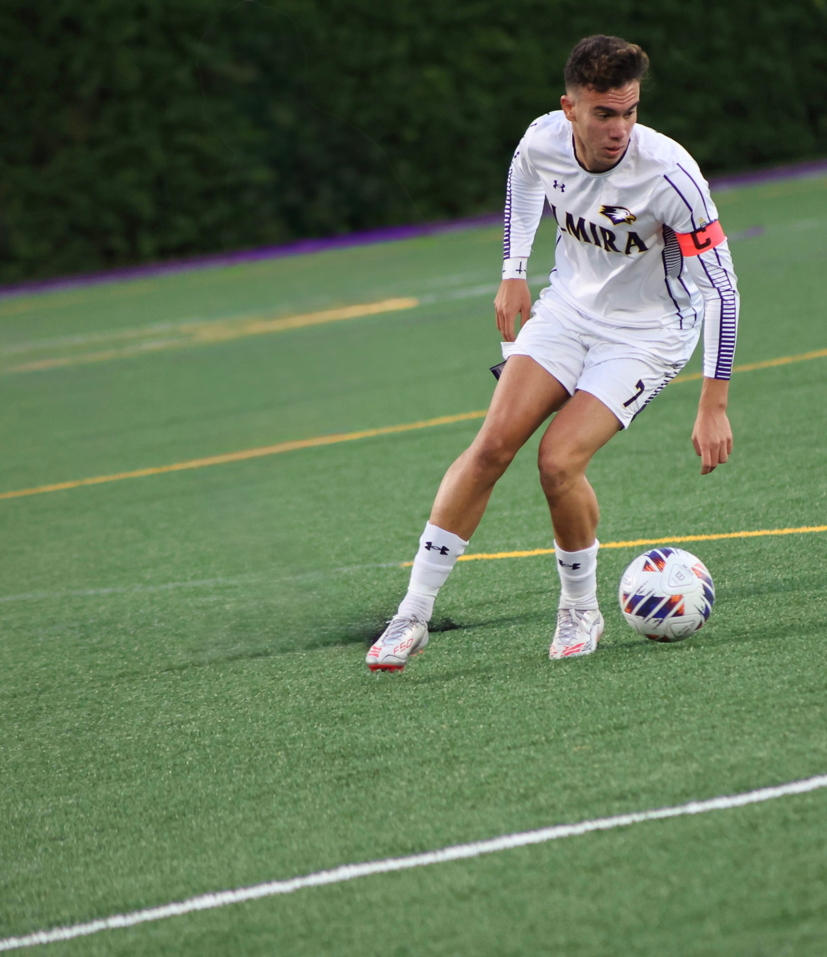 Horacio Vicioso, founder of Built In The Break, on the field in an Elmira soccer kit